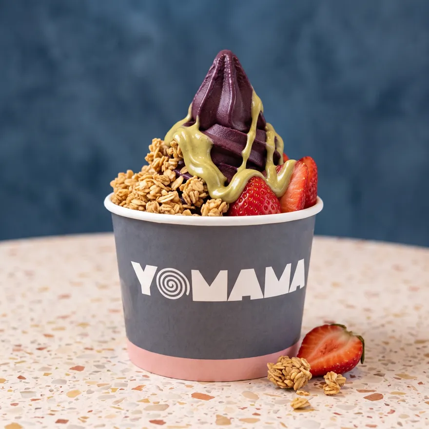 Açaí swirl with house granola, fresh strawberry and pistachio spread